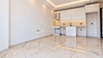 Квартира 1+1 в элитном ЖК, 50 м². Демирташ, Алания - Ракурс 3