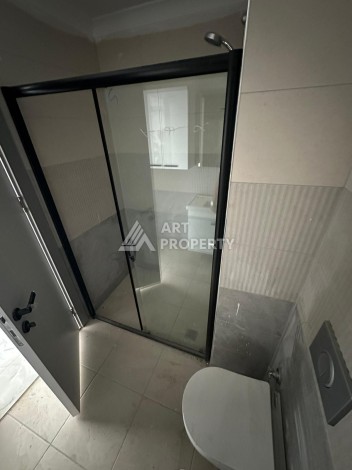 Квартира 1+1 в новом доме в центре Махмутлара, 55 м² - Ракурс 16