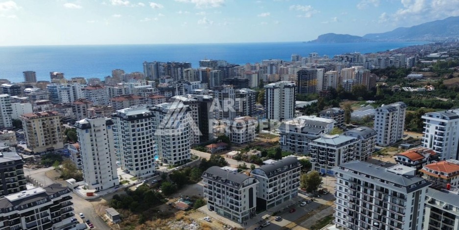 Квартира 1+1 в новом доме в центре Махмутлара, 55 м² - Ракурс 18
