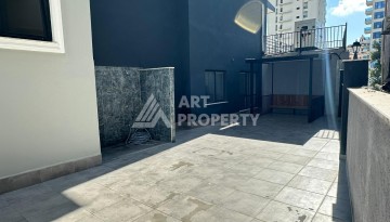 Квартира 1+1 в новом доме в центре Махмутлара, 55 м² - Ракурс 21
