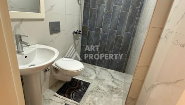 Квартира 2+1 в центре Махмутлара, в 350 м от моря - Ракурс 12
