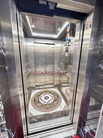 Меблированный дуплекс 2+1 в центре Махмутлара, 110 м² - Ракурс 27