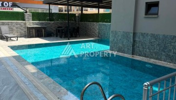 Меблированный дуплекс 2+1 в центре Махмутлара, 110 м² - Ракурс 32