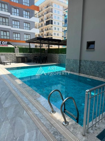 Меблированный дуплекс 2+1 в центре Махмутлара, 110 м² - Ракурс 31