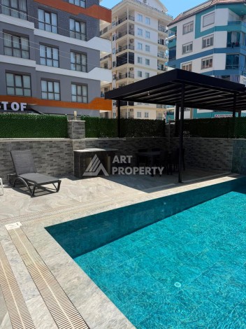 Меблированный дуплекс 2+1 в центре Махмутлара, 110 м² - Ракурс 33