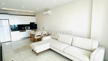 Квартира 1+1 - 65 м² на первой береговой линии в Махмутларе - Ракурс 6