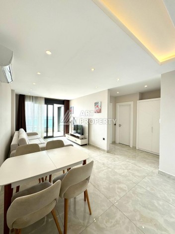 Квартира 1+1 - 65 м² на первой береговой линии в Махмутларе - Ракурс 6
