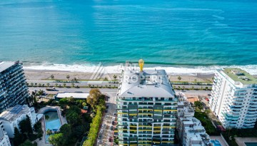 Квартира 1+1 - 65 м² на первой береговой линии в Махмутларе - Ракурс 30