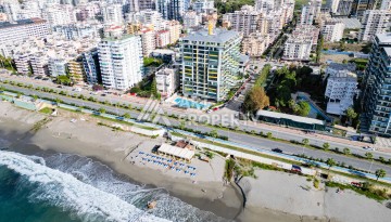 Квартира 1+1 - 65 м² на первой береговой линии в Махмутларе - Ракурс 37