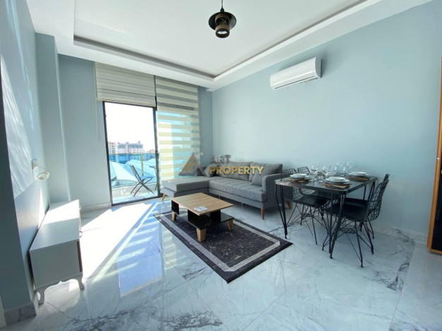 Меблированная двухкомнатная квартира в комплексе с инфраструктурой в Махмутларе, 48 м2 - Ракурс 3