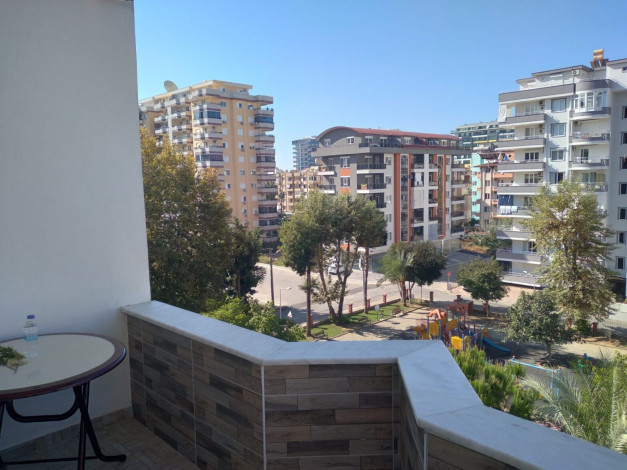 Меблированная двухкомнатная квартира в 150 метрах от моря в районе Махмутлар, 60 м2 - Ракурс 9