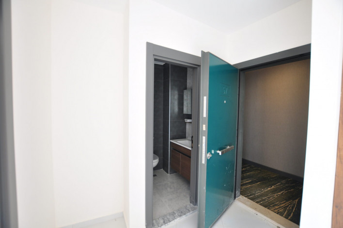 Двухкомнатная квартира в комплексе c инфраструктурой 5-ти звездочного отеля в Махмутларе, 50м2 - Ракурс 2