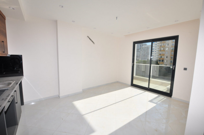 Двухкомнатная квартира в комплексе c инфраструктурой 5-ти звездочного отеля в Махмутларе, 50м2 - Ракурс 3