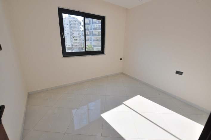 Двухкомнатная квартира в комплексе c инфраструктурой 5-ти звездочного отеля в Махмутларе, 50м2 - Ракурс 5