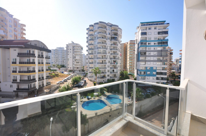 Двухкомнатная квартира в комплексе c инфраструктурой 5-ти звездочного отеля в Махмутларе, 50м2 - Ракурс 7