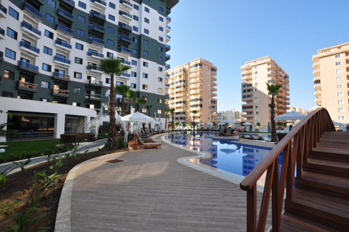 Двухкомнатная квартира в комплексе c инфраструктурой 5-ти звездочного отеля в Махмутларе, 50м2 - Ракурс 14