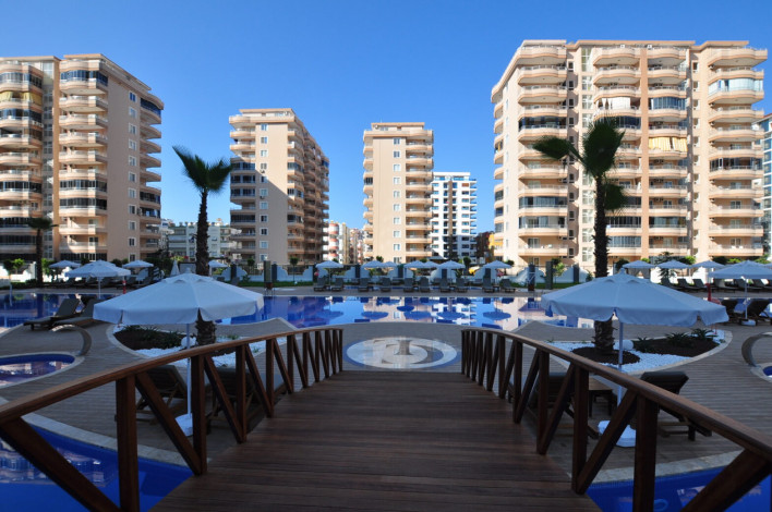 Двухкомнатная квартира в комплексе c инфраструктурой 5-ти звездочного отеля в Махмутларе, 50м2 - Ракурс 15