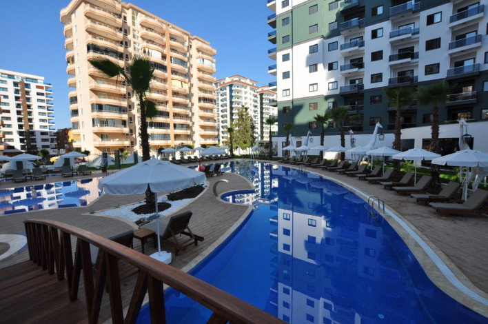 Двухкомнатная квартира в комплексе c инфраструктурой 5-ти звездочного отеля в Махмутларе, 50м2 - Ракурс 16