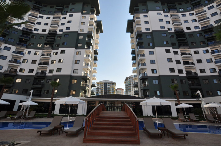 Двухкомнатная квартира в комплексе c инфраструктурой 5-ти звездочного отеля в Махмутларе, 50м2 - Ракурс 17