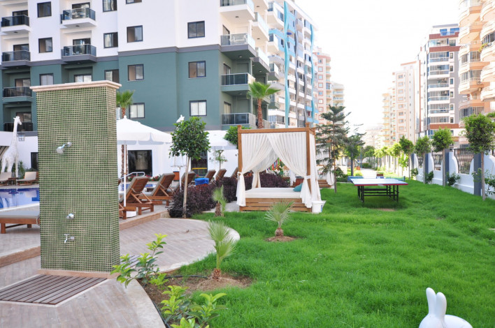 Двухкомнатная квартира в комплексе c инфраструктурой 5-ти звездочного отеля в Махмутларе, 50м2 - Ракурс 20