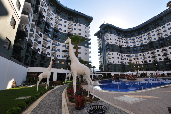 Двухкомнатная квартира в комплексе c инфраструктурой 5-ти звездочного отеля в Махмутларе, 50м2 - Ракурс 25