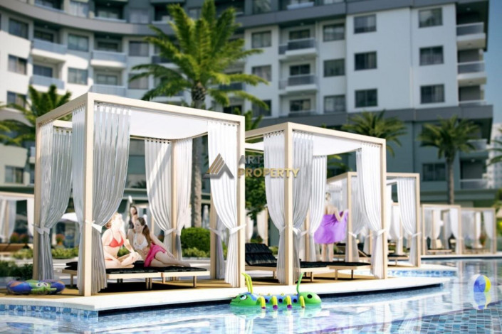 Двухкомнатная квартира в комплексе c инфраструктурой уровня отеля 5 звезд в районе Махмутлар, 55 м2 - Ракурс 3