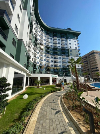 Двухкомнатная квартира в комплексе c инфраструктурой уровня отеля 5 звезд в районе Махмутлар, 55 м2 - Ракурс 12