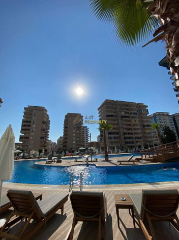 Двухкомнатная квартира в комплексе c инфраструктурой уровня отеля 5 звезд в районе Махмутлар, 55 м2 - Ракурс 13