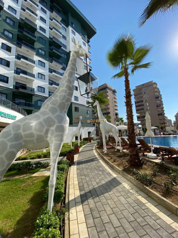 Двухкомнатная квартира в комплексе c инфраструктурой уровня отеля 5 звезд в районе Махмутлар, 55 м2 - Ракурс 18