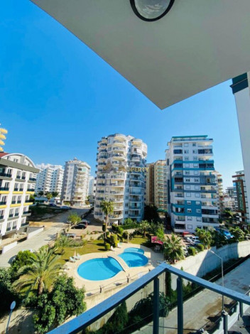 Двухкомнатная квартира в комплексе c инфраструктурой уровня отеля 5 звезд в районе Махмутлар, 55 м2 - Ракурс 24