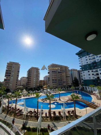 Двухкомнатная квартира в комплексе c инфраструктурой уровня отеля 5 звезд в районе Махмутлар, 55 м2 - Ракурс 30