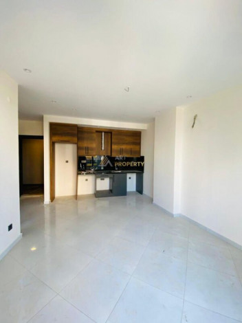 Двухкомнатная квартира в комплексе c инфраструктурой уровня отеля 5 звезд в районе Махмутлар, 55 м2 - Ракурс 36