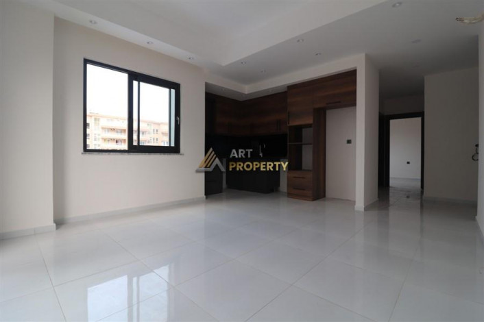 Квартира 2+1 в комплексе c инфраструктурой уровня отеля 5 звезд в районе Махмутлар, 86 м2 - Ракурс 2