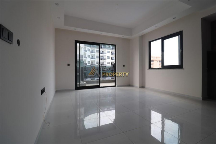 Квартира 2+1 в комплексе c инфраструктурой уровня отеля 5 звезд в районе Махмутлар, 86 м2 - Ракурс 5