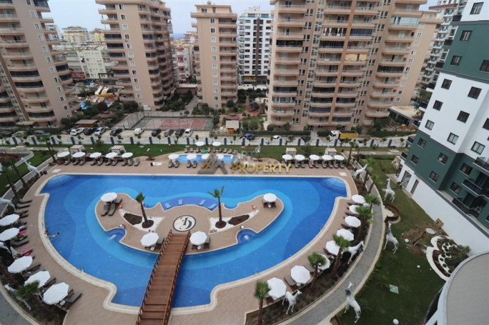 Квартира 2+1 в комплексе c инфраструктурой уровня отеля 5 звезд в районе Махмутлар, 86 м2 - Ракурс 6