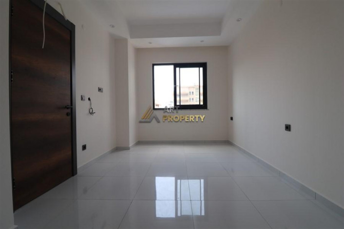 Квартира 2+1 в комплексе c инфраструктурой уровня отеля 5 звезд в районе Махмутлар, 86 м2 - Ракурс 9