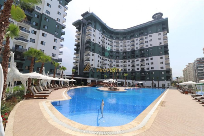 Квартира 2+1 в комплексе c инфраструктурой уровня отеля 5 звезд в районе Махмутлар, 86 м2 - Ракурс 16