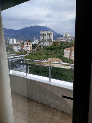 Полностью меблированный современный пентхаус 2+1 в новом комплексе в районе Махмутлар, 95 м2 - Ракурс 17