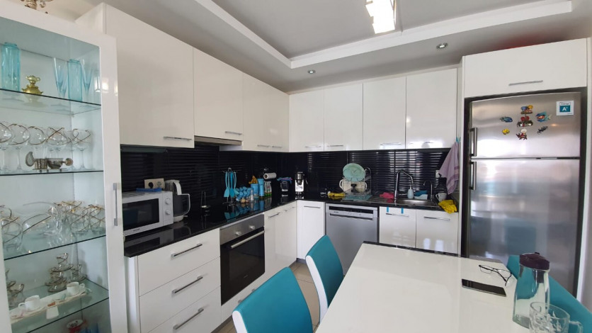 В районе Джикджили продаются двухкомнатные апартаменты с частичным видом на море, 60м2 - Ракурс 7