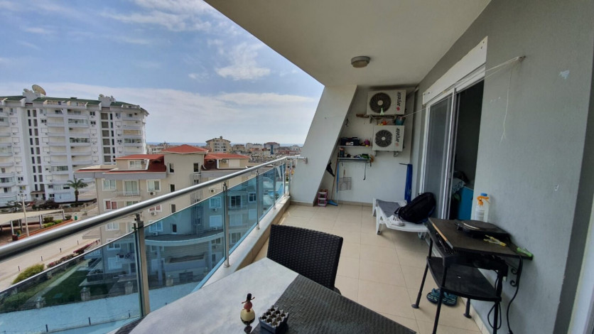 В районе Джикджили продаются двухкомнатные апартаменты с частичным видом на море, 60м2 - Ракурс 10