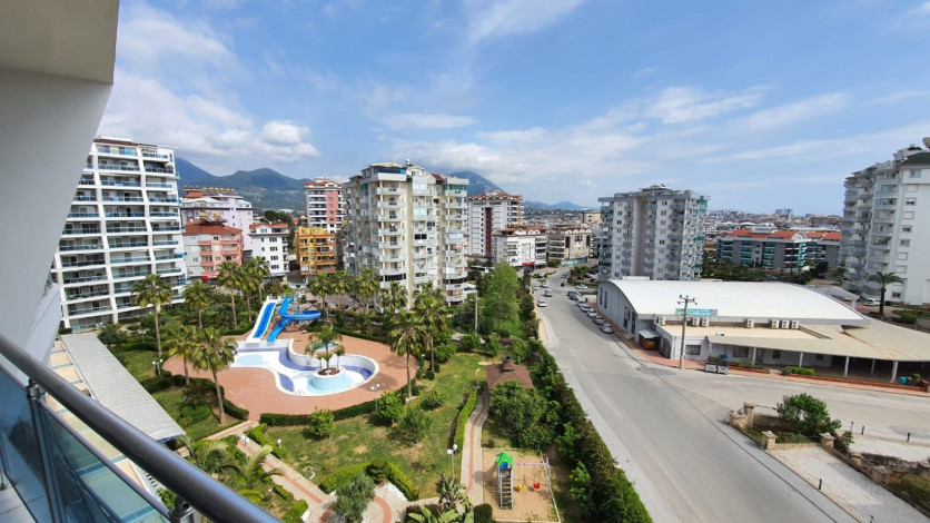 В районе Джикджили продаются двухкомнатные апартаменты с частичным видом на море, 60м2 - Ракурс 12