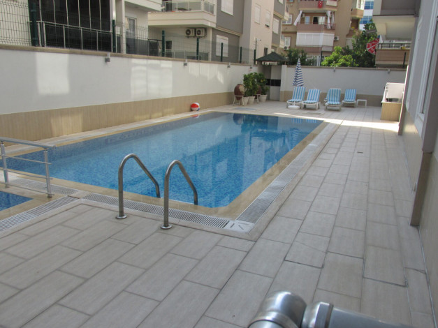 Трехкомнатная меблированная квартира в районе пляжа Клеопатра в центре Аланьи, 100 м2 - Ракурс 29