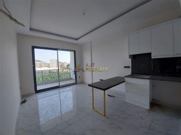 Квартира 1+1 в комплексе с инфраструктурой в начале Махмутлара, 80 м2 - Ракурс 44