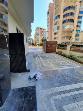 Трехкомнатная квартира в комплексе класса люкс в районе Махмутлар, 110 м2 - Ракурс 4