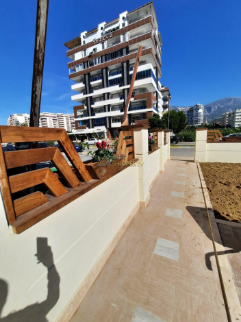 Трехкомнатная квартира в комплексе класса люкс в районе Махмутлар, 110 м2 - Ракурс 7