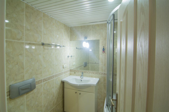 Трехкомнатная квартира с крытым бассейном в районе Джикджилли, 110 м2 - Ракурс 18