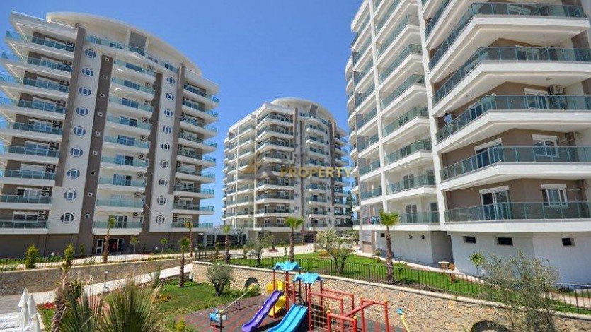 Трехкомнатная квартира 2+1 в жилом комплексе с богатой инфраструктурой в районе Авсалар, 110м2 - Ракурс 12