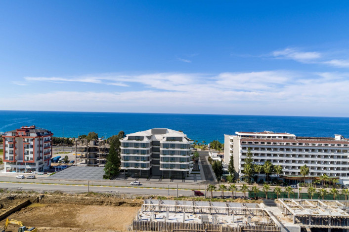 Наша гордость! Проект премиум класса Nordic Art на этапе строительства в районе Каргыджак на первой линии моря, 68-181 м2 - Ракурс 17