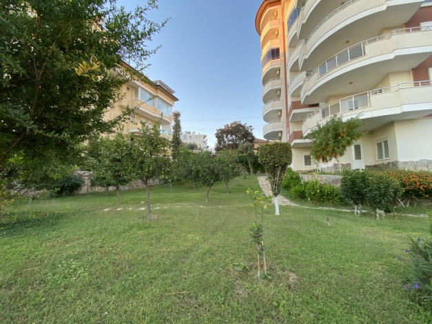 Просторная трехкомнатная квартира с частичным видом на море в районе Авсаллар, 115 м2 - Ракурс 20