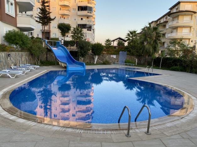 Просторная трехкомнатная квартира с частичным видом на море в районе Авсаллар, 115 м2 - Ракурс 23